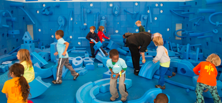 Students in the "Play Work Build" room at the National Building Museum. 